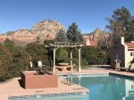 A seasonal communal pool with red rock views is a bonus in the summer months